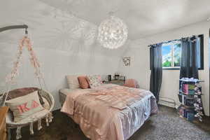 Upstairs bedroom is carpeted and features cool architecture
