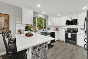 Kitchen was remodeled in the last few years, adding additional larger windows, additional light, quartz countertops, new cabinets, flooring and appliances in the last few years. Appliances are included.