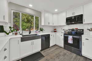 Kitchen was remodeled in the last few years, adding additional larger windows, additional light, quartz countertops, new cabinets, flooring and appliances in the last few years. Appliances are included.