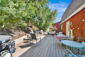 Wooden deck with an outdoor living space