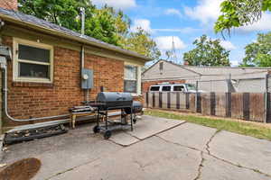 View of patio with area for grilling