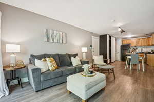 Living area with wood finished floors
