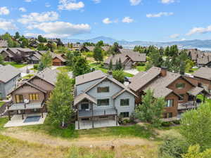 Aerial view of residential area with a mountainous background