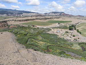 View of mountain background featuring rural landscape