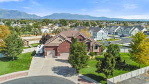 Aerial view of residential area with a mountain backdrop