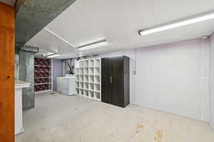 Finished basement Laundry featuring washer and dryer