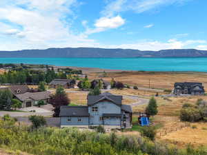 View from above of property featuring a water and mountain view