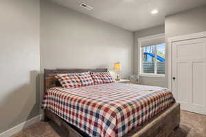 Bedroom with carpet and recessed lighting