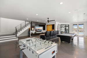 Rec room featuring pool table, recessed lighting, a ceiling fan, and french doors
