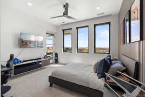 Carpeted bedroom featuring access to outside, a ceiling fan, and recessed lighting