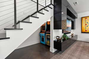 Stairway featuring baseboards