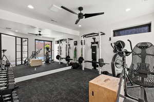 Exercise room with recessed lighting, ceiling fan, and carpet floors