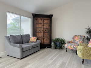 Living area featuring light wood-style flooring