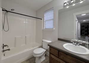 Bathroom with  shower combination, light tile patterned floors, and vanity