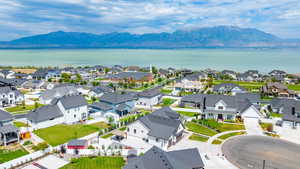 Aerial view of residential area with a water and mountain view