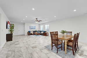 Dining space featuring recessed lighting and ceiling fan