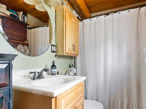 Bathroom with vanity and light tile patterned floors