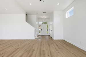 Foyer featuring recessed lighting, light wood finished floors, and a ceiling fan