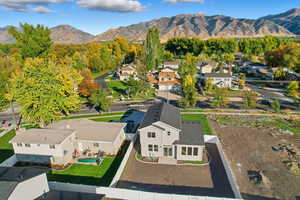 Aerial view of residential area featuring a mountain backdrop