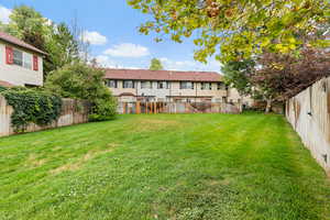 View of fenced backyard