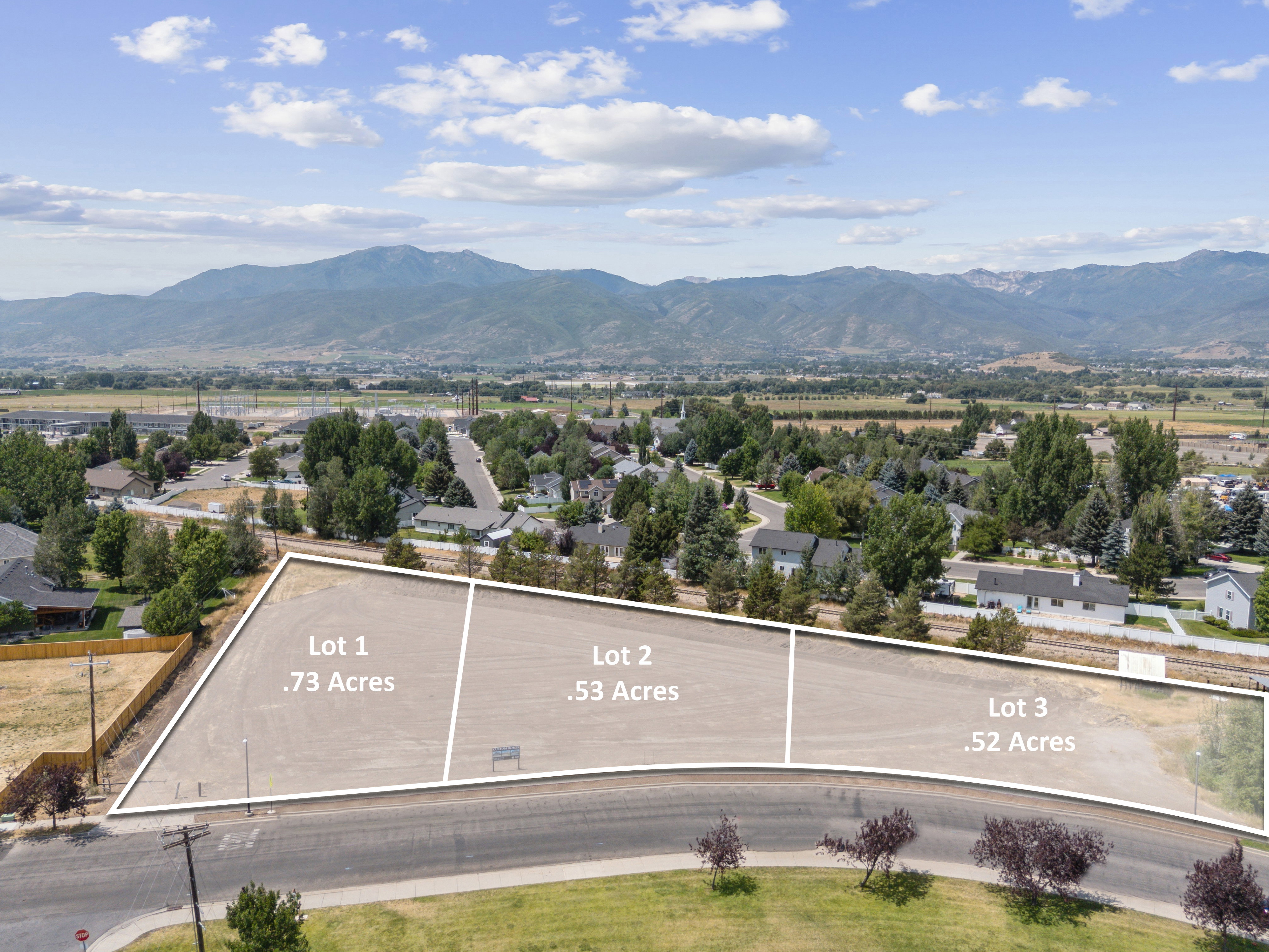 View of mountain backdrop with nearby suburban area