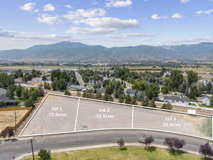 View of mountain backdrop with nearby suburban area
