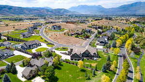 Aerial view of residential area with a mountain backdrop