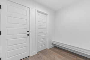 Mudroom featuring light wood-type flooring