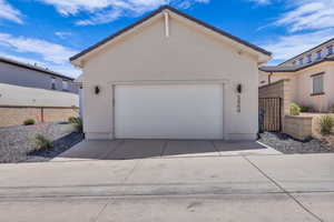 Garage with concrete driveway