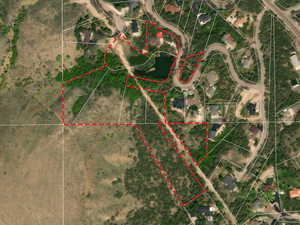 Aerial overview of property's location with property parcel outlined