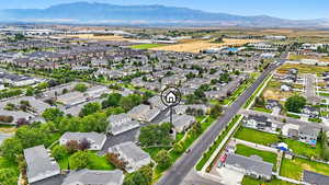 Aerial view of residential area with a mountainous background