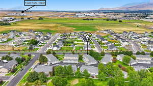 View of property location featuring nearby suburban area and a mountainous background