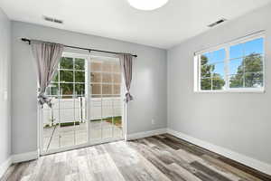 Unfurnished room with light wood-style floors