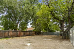 View of fenced backyard