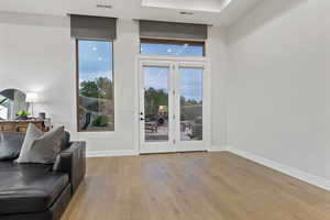 Living area with wood-type flooring and baseboards