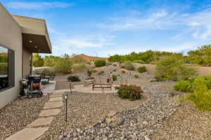 Fenced backyard featuring a patio area