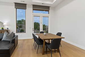 Dining area featuring light wood finished floors and baseboards