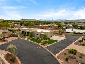 Aerial view of residential area with a mountainous background
