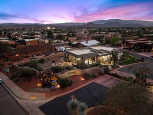 Aerial view at dusk of a residential view and a mountain view
