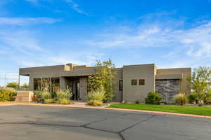 View of front of home featuring stucco siding