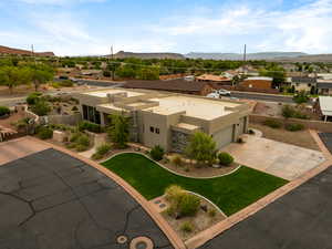 Aerial view of residential area with a mountainous background