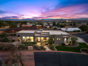 Back of house featuring stucco siding and a mountain view