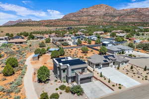 Aerial view of residential area with a mountain backdrop