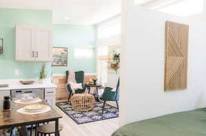 Dining area featuring light wood-style floors