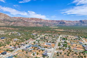 Aerial view of residential area with a mountain backdrop