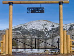 Gate featuring a mountain view