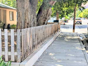 View of concrete road featuring sidewalks