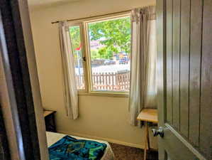 Bedroom featuring baseboards
