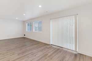 Unfurnished room featuring recessed lighting and light wood-style flooring