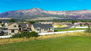 View of mountain backdrop with nearby suburban area
